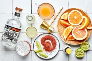 tequila blanco, grapefruit juice, lime juice, bitters, grapefruit soda, salt a jigger and a salt rimmed glass for Paloma