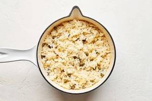 Lemon parmesan rice made with chicken broth, garlic powder, lemon zest & juice, butter, parmesan, salt, pepper & capers