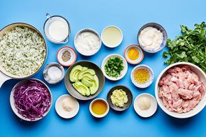 spices, chicken, cilantro-lime rice, cilantro, lime juice, olive oil and honey in bowls