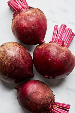 raw beets on the counter to use to make homemade roasted beets