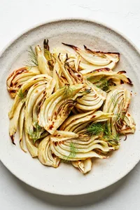 roasted fennel on a serving plate made with olive oil, salt, garlic powder and pepper