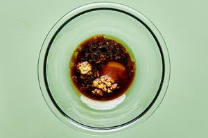 sugar, garlic, ginger, sesame oil, soy sauce, and vegetable oil in a glass bowl to make marinade for ahi tuna