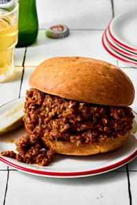 a homemade sloppy joe made with ground beef, jalapeno, bell pepper, garlic, onion, ketchup, worcestershire, mustard & spices