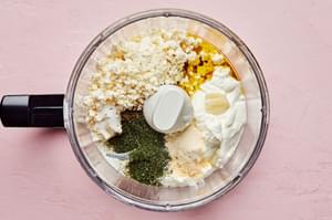 feta, yogurt, garlic, salt, onion powder, garlic powder, dill, basil, oregano, olive oil and lemon juice in a food processor