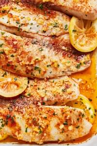 baked tilapia seasoned with salt, paprika, garlic, lemon zest, panko breadcrumbs, and pepper