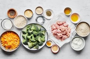 Cream of chicken soup, milk, Sour cream, chicken Bouillon, spices, rice, broccoli, chicken, cheese & panko in prep bowls