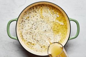 butter, garlic, white wine, heavy cream, chicken stock, bouillon, Italian seasoning, pepper and salt in a skillet