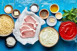 4 pork chops, crushed tomatoes, onions, spices, basil parmesan, olive oil, apple cider vinegar, sugar & butter in prep bowls