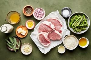 pork chops, asparagus, parmesan, cream, butter, shallot, sage, garlic, lemon juice & zest, salt, pepper & stock in prep bowls