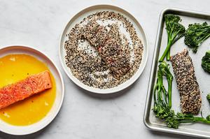 salmon dipped in egg & sesame oil then rolled in sesame seeds and placed on a baking sheet