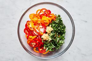peppers, cilantro, basil, garlic, ginger, sesame oil, lime juice and salt in a bowl to make pepper salad