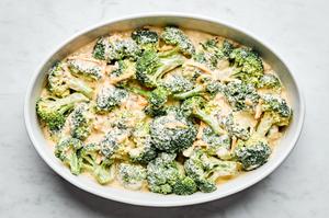 broccoli, cheese, cream of mushroom soup, mayonnaise, mustard, grated onion, onion powder, and eggs tossed in a baking dish