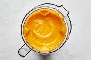 carrot ginger soup in a blender blended until smooth