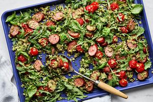 Cauliflower Rice Sheet Pan made with smoked sausage, pesto, cherry tomatoes, arugula, basil, salt & pepper