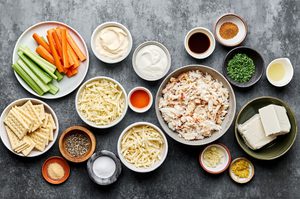 cream cheese, mayo, sour cream, spices, Worcestershire, lemon juice, hot sauce, cheese & crab meat in prep bowls
