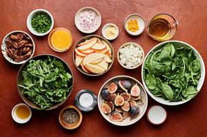 spinach, arugula, figs, goat cheese, apple, candied pecans, chives, pepper, olive oil, dijon and orange zest in prep bowls