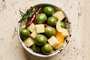 green olives and Gruyère marinated in garlic, orange, rosemary, peppercorn, dried chili and olive oil