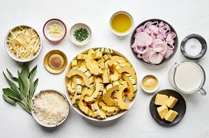 squash, butter, shallots, garlic, sage, thyme, cream, dijon, gruyere and Parmesan, ground nutmeg in prep bowls