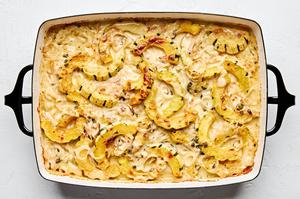squash gratin made with cream, butter, shallots, nutmeg, thyme, sage, garlic, dijon, Parmesan and Gruyère