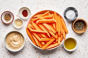 sweet potatoes, olive oil, brown sugar, garlic, chipotle chili powder, salt, pepper and chipotle mayo in prep bowls