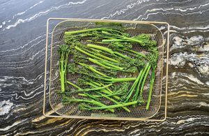 crispy baby broccoli fresh out of the air fryer