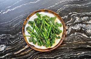 crispy air fried broccoli on top of lemony whipped cottage cheese
