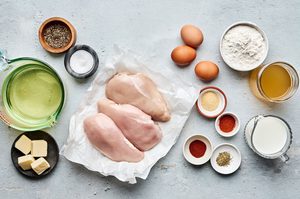 ingredients prepped and laid out to make chicken fried chicken with rich and creamy country gravy