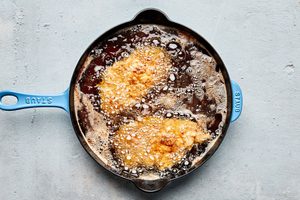 chicken fried chicken deep frying in oil to make the ultimate comfort food dinner