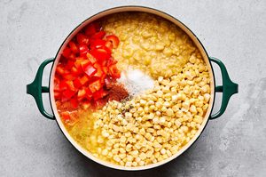 a pot of homemade creamy corn chowder being simmered