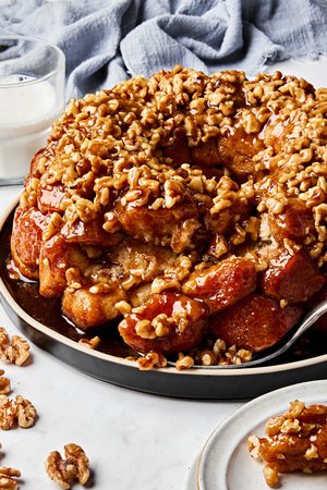 Homemade monkey bread topped with crunchy walnuts, baked to golden perfection, the perfect brunch or holiday breakfast