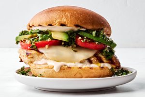 a grilled chicken sandwich with provolone, marinated tomatoes, balsamic mayo & avocado, the perfect summer sandwich