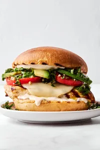 a grilled chicken sandwich with provolone, marinated tomatoes, balsamic mayo & avocado, the perfect summer sandwich