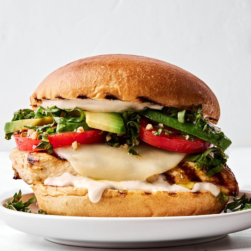 a grilled chicken sandwich with provolone, marinated tomatoes, balsamic mayo & avocado, the perfect summer sandwich