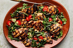 marinated grilled chicken thighs topped with a blistered green bean salad tossed with an asian inspired dressing.