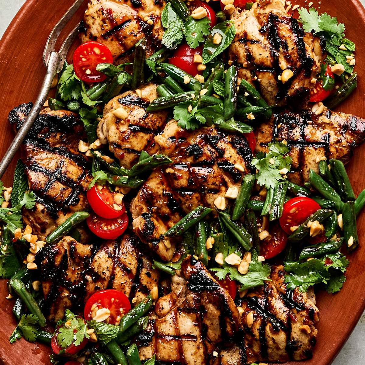 asian inspired grilled chicken with blistered green bean salad - perfect for a light, healthy dinner with bold umami flavor.