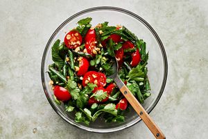 blistered green bean salad with tomatoes, peanuts, mint and cilantro tossed in an asian dressing with fish sauce & lime