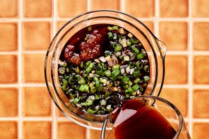 stir fry sauce being made in a bowl to use for a ground turkey stir fry with cabbage, mushrooms and cauliflower rice