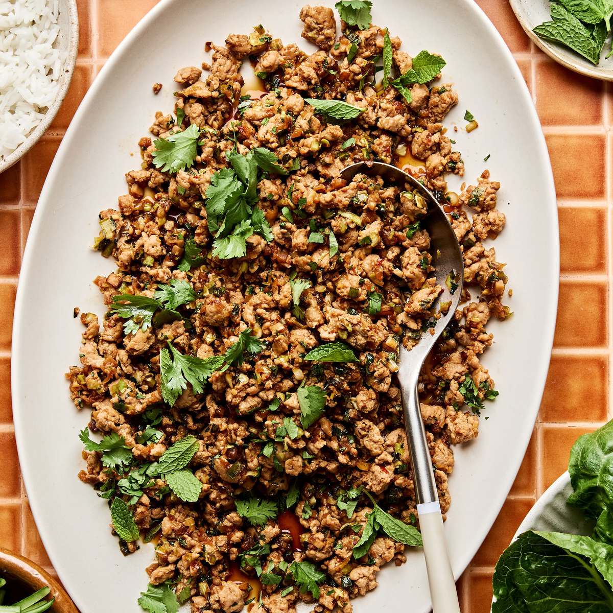 Ground turkey stir fry on a large platter made with cabbage, mushrooms, and cauliflower rice. A delicious low-carb dinner.