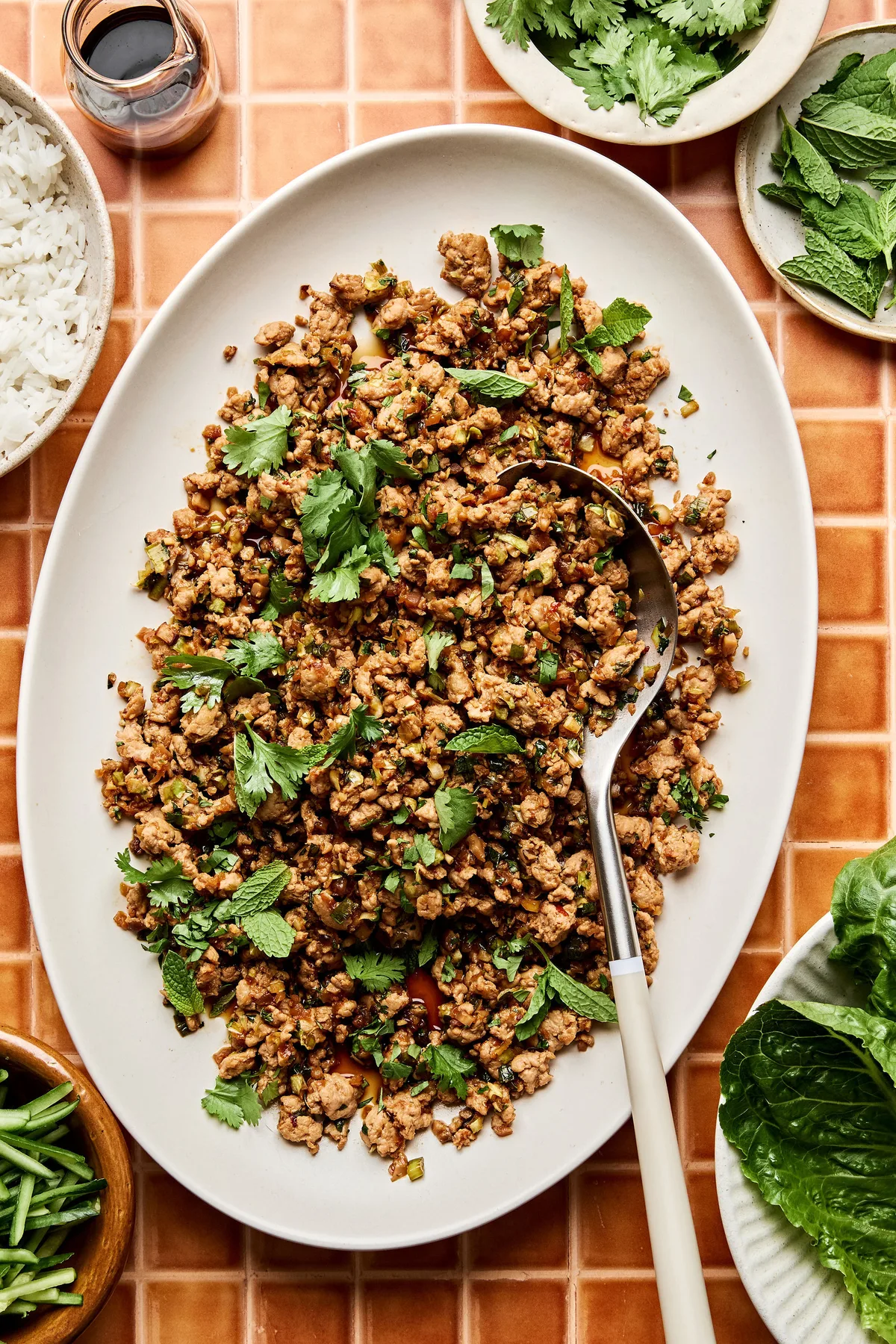 Ground turkey stir fry on a large platter made with cabbage, mushrooms, and cauliflower rice. A delicious low-carb dinner.