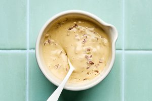 a bowl of homemade miso dressing to use for sesame chicken salad