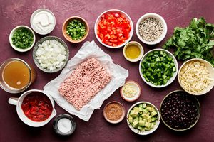 ingredients prepped and laid out to make southwest turkey & quinoa soup with black beans, bell pepper and tomatoes