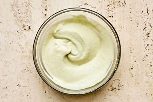 a bowl of homemade creamy wasabi dressing ot use on teriyaki salmon bowls