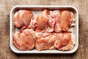 boneless, skinless chicken thighs seasoned with salt, garlic powder, paprika, cumin and cinnamon