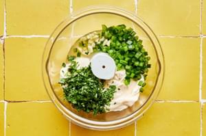 mayonnaise, jalapeño, lime juice, minced garlic and minced fresh cilantro in a food processor