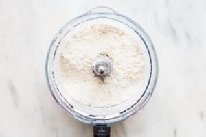 butter, flour, baking soda, baking powder pulsed in the base of a food processor
