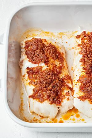 baked cod cooked in melted butter and seasoned with garlic powder, onion powder, paprika, salt & pepper