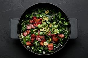 bacon, olives, swiss chard, garlic and onions in a skillet