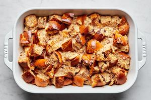 homemade baked french toast made with challah bread in a baking dish