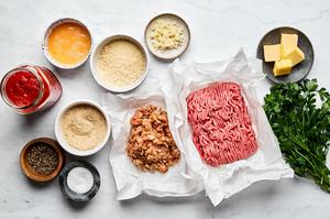 ground beef, ground Italian sausage, breadcrumbs, Parmesan, parsley, eggs, spices, marinara and butter in prep bowls
