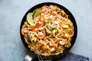 Bang Bang Shrimp Pasta in a pan with cream sauce